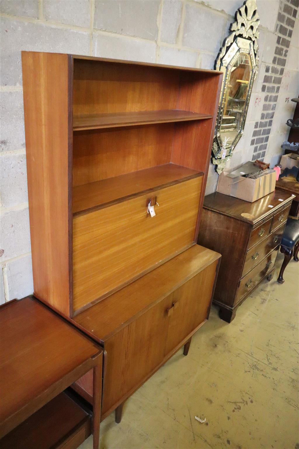 A mid century design teak tea trolley and a two part cabinet, width 102cm, depth 46cm, height 172cm